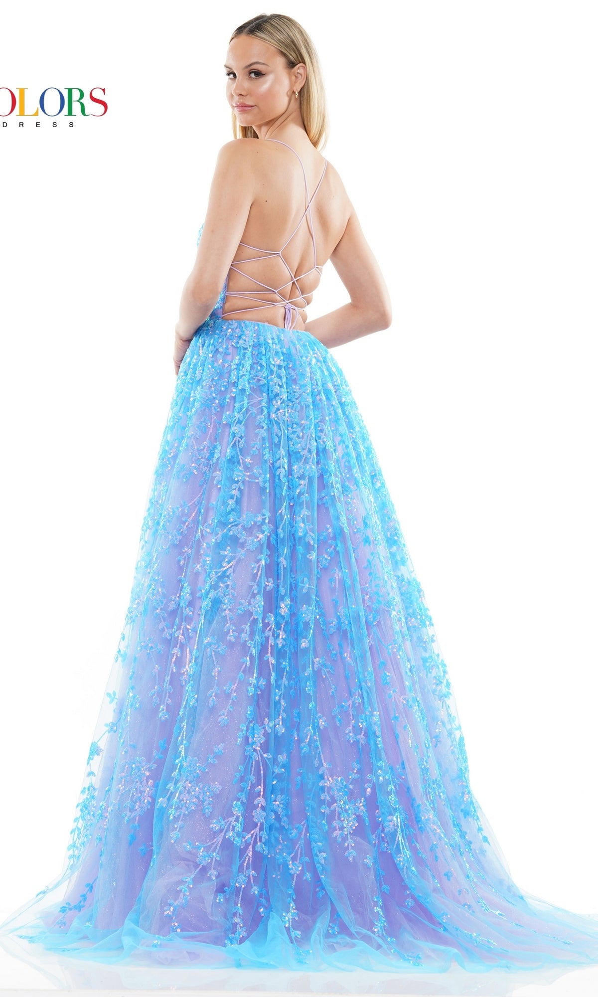A woman wearing the Sequin-Embroidered Backless Long Prom Dress 3247 stands with her back turned, looking over her shoulder.
